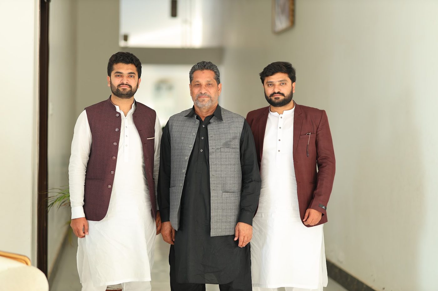 Abdul Rasheed Gill with two of his sons